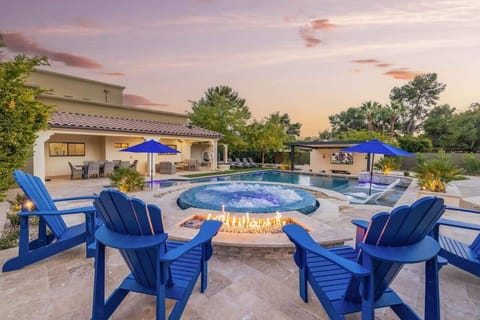 Ignite your evenings: fire, water, and desert serenity combined.