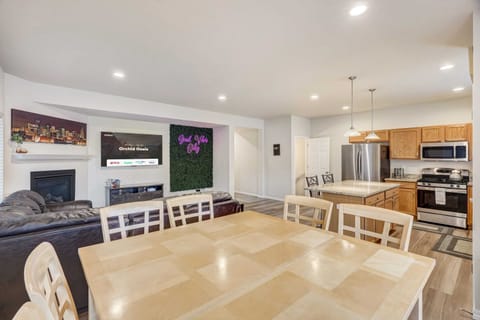 Cook your favorites or order delicious takeout while gathering around the large dining table!