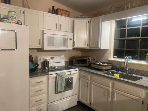 Kitchen is equipped with most of what you need for a comfortable stay