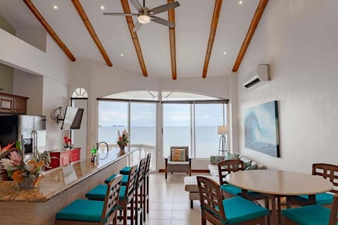 Full Kitchen view and Living Room Area.