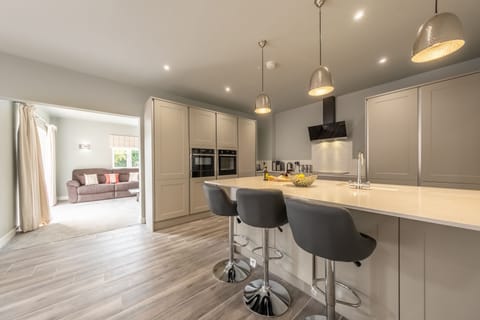 Kitchen with central island peninsula