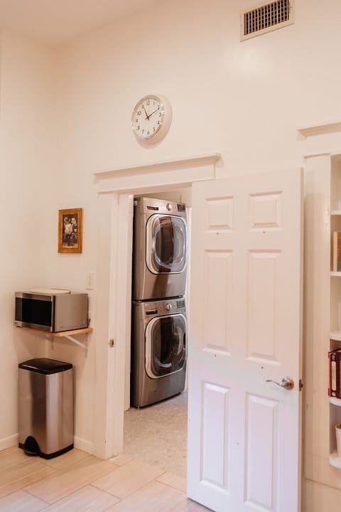 Off the back of the kitchen is the laundry with XL capacity, and guest bath.