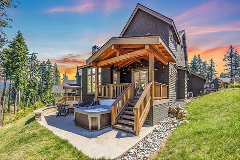 Grand Timber-Frame Entry With Mountain Backdrop + Cozy Outdoor Lounge Setup