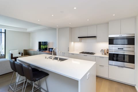 kitchen and dining area - Elegant, high-end fully-equipped and ready for all your cooking needs.