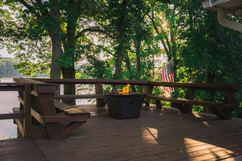Additional seating on the deck with gas fire pit