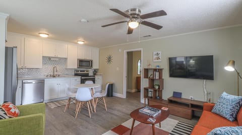 The living room, dining and kitchen are all an open floor concept.