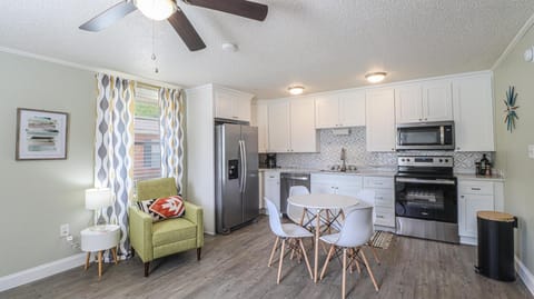 The living room, dining and kitchen are all an open floor concept.