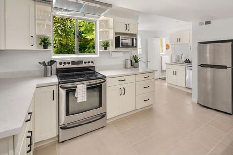 Your newly renovated kitchen receives plenty of natural light in the morning.
