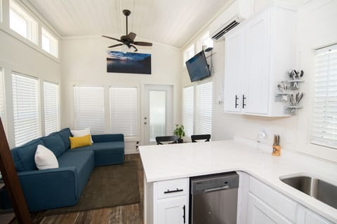 Living room view from the kitchen with dishwasher for easy clean-ups.
