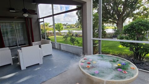 Smoky Fountain on the patio with garden and lake view