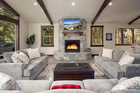Living Room with Gas Fireplace as the Main Focus. Large ROKU TV for Streaming your Favorites!
