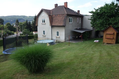 A family house with garden, terrace and grill