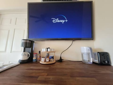 Coffee Bar with a Variety of K-Cup Coffee, Cream, and Sugar