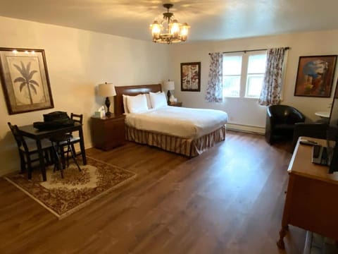 Private suite with queen-sized bed, dinette, satellite TV, coffee nook, kitchenette and bath with shower...