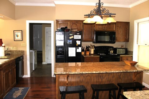 the kitchen is well stocked for cooking 