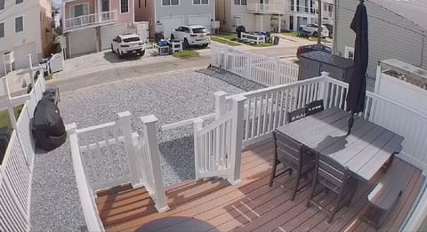 NEWER back patio deck with furniture for dining al fresco!