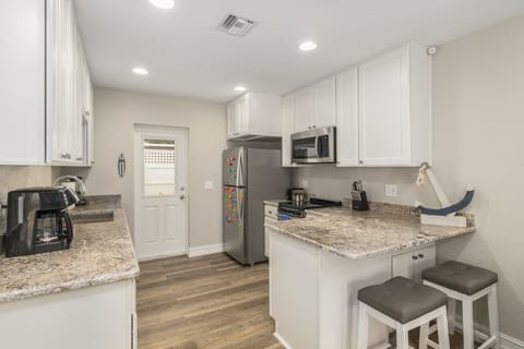 Beautiful kitchen with granite bartop