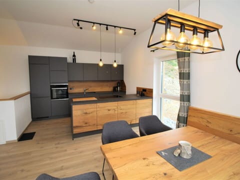 Table, Property, Furniture, Cabinetry, Building, Wood, Drawer, Lighting, Interior Design, Flooring