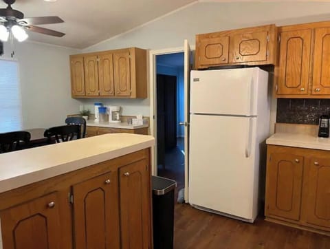Breakfast bar provides additional seating and countertop space.