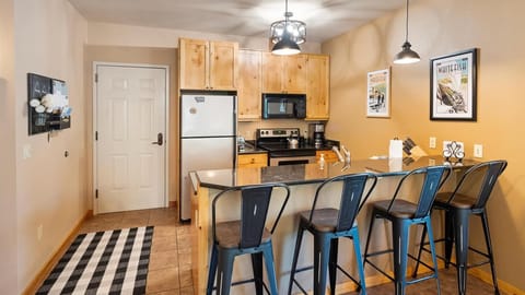 Open concept kitchen that is fully stocked with all the cookware to cook a meal of your dreams!