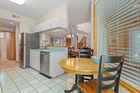 Fully stocked kitchen with bathroom & access to Queen Bedroom on the left