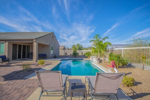 Large private backyard with built-in pool, outside seating, gas firepit, BBQ
