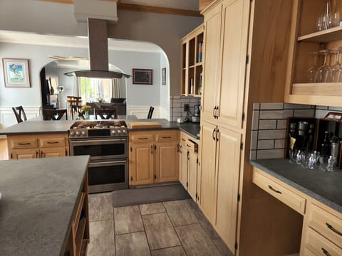 More kitchen with all Quartz Ceasarstone counter tops, subway tile backsplash.