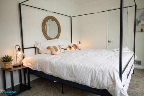 Bedroom with king bed and natural light
