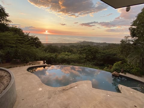 View from second kitchen of private pool and terrace area