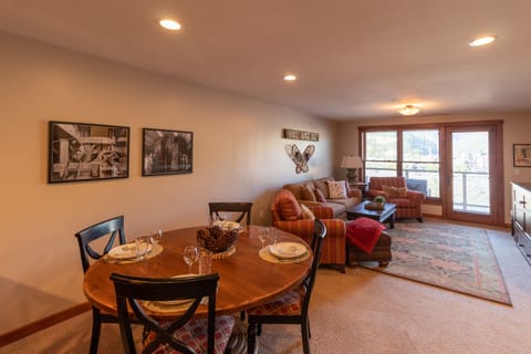 Spacious unit with relaxing living room and dining area.