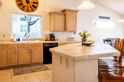 Fully stocked kitchen with island seating