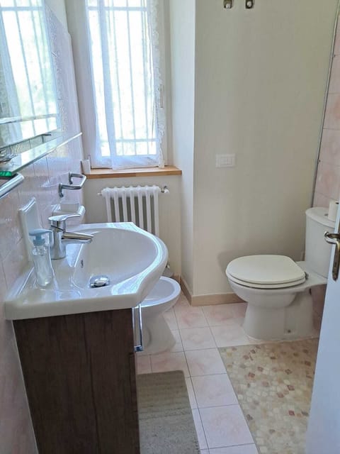 Small bathroom on the ground floor with shower