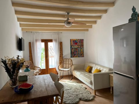Kitchen with living room and TV