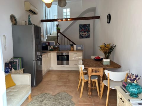 Kitchen with living room and TV