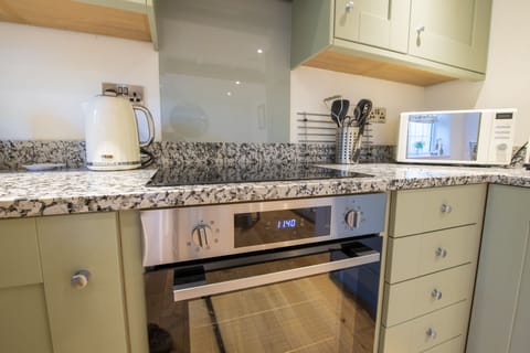 Ground floor: Modern appliances in the stylish kitchen