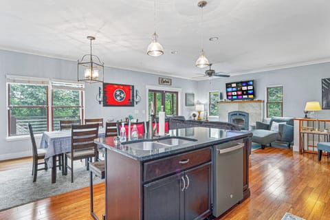 Upper- Living Room with Queen Pull-out & Large 4K TV (1)