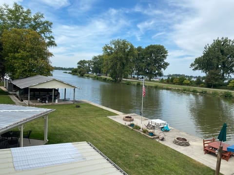 No Wake canal allows for passers by to gently parade through and say hello.