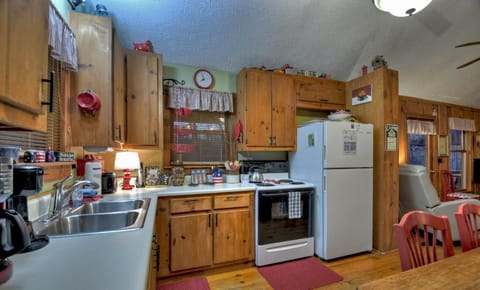 Charming kitchen with full amenities, ready for your culinary adventures.