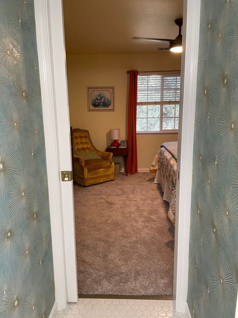 Entry to the bathroom through the garden room or through the hallway. 