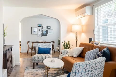 Living room with views into dining room