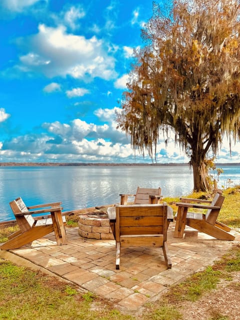 Where the fire crackles and the lake listens.