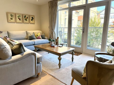 living room seats 8 with sofabed and balcony