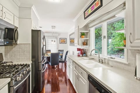 Gas stove and the kitchen is stocked with all the cookware you'll need