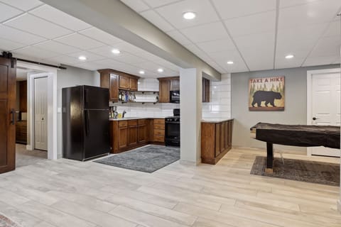 Lower level kitchen and air hockey 