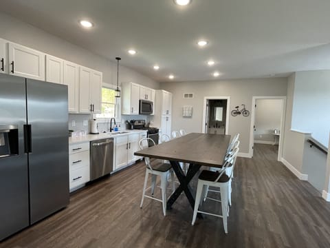 Very spacious fully equipped kitchen with seating for 8.