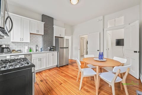 Kitchen looking into back bathroom/ bedroom