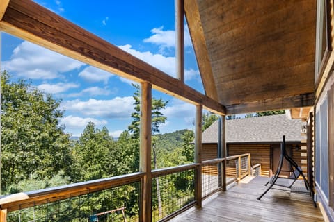 Porch Swing Overlooking Peaceful Wooded Mountains