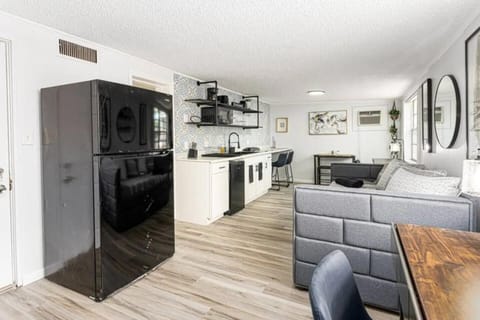 kitchen space, dining room and trundle bed