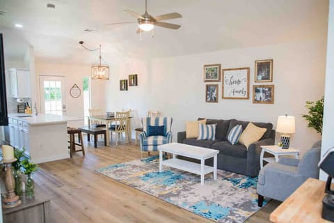 Living room, dining room, and part of the kitchen to the left.  The couch pulls out to be a full size bed.