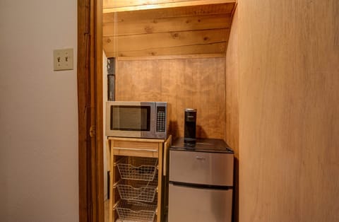 upstairs landing has closet with small refrigerator, microwave and kurig coffee 